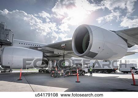 Stock Photo - A380 aircraft being refuelled at airport. Fotosearch