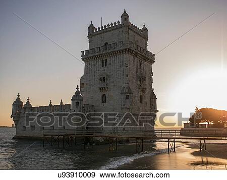 Stock Photo - Belem Tower and footbridge at sunset, Lisbon, Portugal. Fotosearch