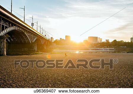 Stock Photo - Bridge in sunlight, Warsaw, Poland. Fotosearch