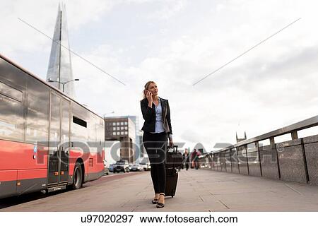 Businesswoman on business trip, London, UK View Large Photo Image Stock Photo - Businesswoman on business trip, London, UK. Fotosearch