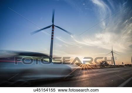 Car speeding past wind turbines, Cagliari, Sardinia, Italy View Large Photo Image Stock Photography - Car speeding past wind turbines, Cagliari, Sardinia, Italy. Fotosearch