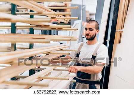 Carpenter in workshop View Large Photo Image Stock Image - Carpenter in workshop. Fotosearch