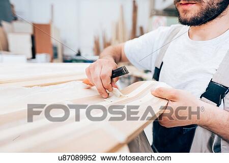 Carpenter working skateboard View Large Photo Image Stock Image - Carpenter working skateboard. Fotosearch