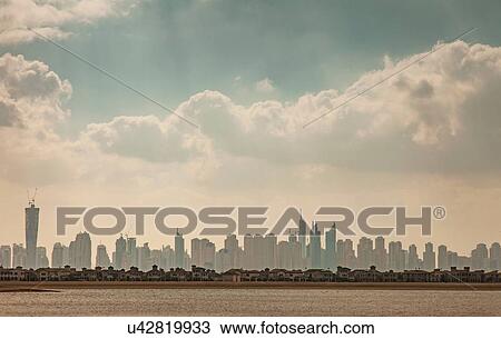 Dubai skyline and villas of Palm Jumeira Island, Dubai, United Arab Emirates View Large Photo Image Stock Image - Dubai skyline and villas of Palm Jumeira Island, Dubai, United Arab Emirates. Fotosearch