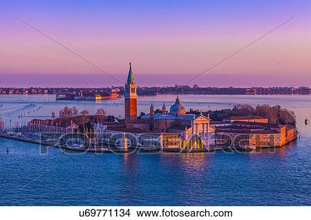 Elevated view of an island in Venetian Lagoon at sunset, Italy View Large Photo Image Picture - Elevated view of an island in Venetian Lagoon at sunset, Italy. Fotosearch