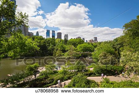 Elevated view of Central Park lake and city skyline, New York, USA View Large Photo Image Stock Photo - Elevated view of Central Park lake and city skyline, New York, USA. Fotosearch