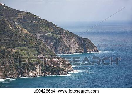 Elevated view of cliff village and Mediterranean, Cornelia, Cinque Terre, Italy View Large Photo Image Picture - Elevated view of cliff village and Mediterranean, Cornelia, Cinque Terre, Italy. Fotosearch