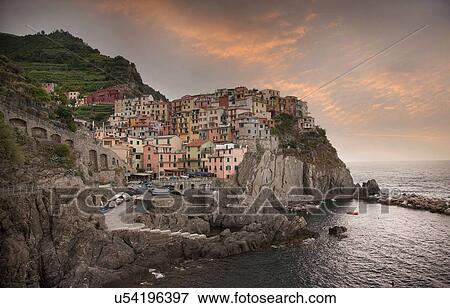 Elevated view of manarola village and Mediterranean, Cinque Terre, Italy View Large Photo Image Stock Photo - Elevated view of manarola village and Mediterranean, Cinque Terre, Italy. Fotosearch