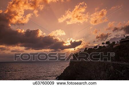 Elevated view of Mediterranean at sunset, Vernazza, Cinque Terre, Italy View Large Photo Image Stock Photo - Elevated view of Mediterranean at sunset, Vernazza, Cinque Terre, Italy. Fotosearch