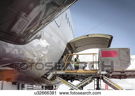 Freight loader on A380 aircraft View Large Photo Image Stock Image - Freight loader on A380 aircraft. Fotosearch