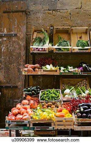 Stock Photo - Fresh fruit and vegetable stall, Florence, Italy. Fotosearch