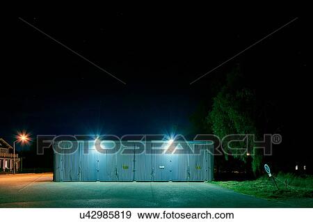 Stock Photo - Garage with spotlights at night, Kalmar, Sweden. Fotosearch