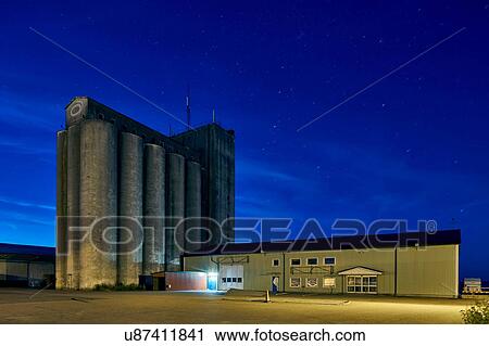 Industrial buildings and starry sky at night, Kalmar, Sweden View Large Photo Image Stock Image - Industrial buildings and starry sky at night, Kalmar, Sweden. Fotosearch