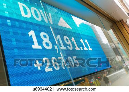 Stock Image - Japanese currency data screen in window, New York, USA. Fotosearch