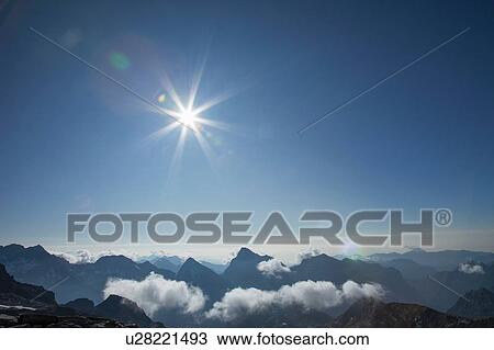 Low clouds and mountain view, Zermatt, Canton Wallis, Switzerland View Large Photo Image Stock Image - Low clouds and mountain view, Zermatt, Canton Wallis, Switzerland. Fotosearch