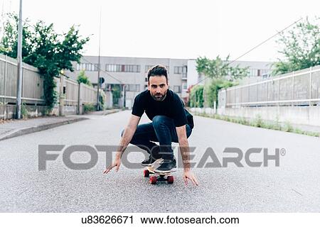 Stock Image - Man skateboarding. Fotosearch
