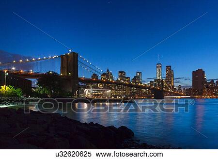 Manhattan financial district and Brooklyn bridge at night, New York, USA View Large Photo Image Stock Photography - Manhattan financial district and Brooklyn bridge at night, New York, USA. Fotosearch