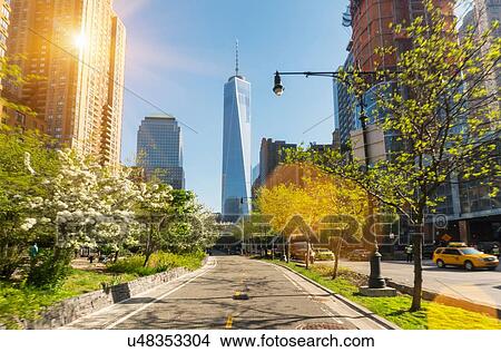Manhattan financial district cycle path and One World Trade Center, New York, USA View Large Photo Image Picture - Manhattan financial district cycle path and One World Trade Center, New York, USA. Fotosearch