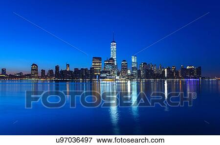 Manhattan financial district skyline and One World Trade Centre at night, New York, USA View Large Photo Image Stock Photo - Manhattan financial district skyline and One World Trade Centre at night, New York, USA. Fotosearch