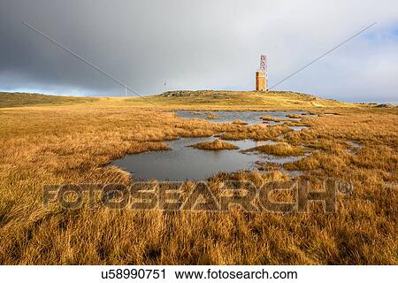 Stock Image - Marsh and tower, Hvalnestangi, Iceland. Fotosearch