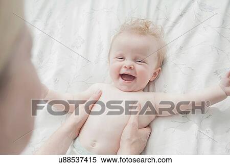 Mother and baby daughter face to face, laughing View Large Photo Image Stock Photography - Mother and baby daughter face to face, laughing. Fotosearch