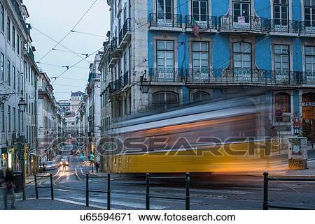 Old town cityscape with moving tram, Lisbon, Portugal View Large Photo Image Stock Image - Old town cityscape with moving tram, Lisbon, Portugal. Fotosearch