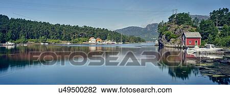 Stock Image - Panoramic view of fjord and village, Mosterhamn, Norway. Fotosearch