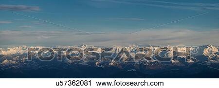 Stock Image - Panoramic view of snow capped alps between Italy and Austria, Trentino Alto Adige, Italy. Fotosearch