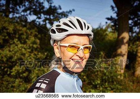 Stock Photography - Portrait of mature cyclist. Fotosearch
