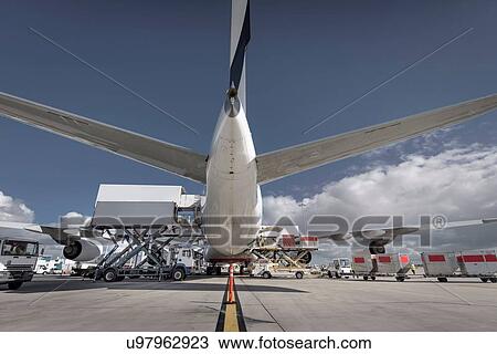 Rear view of A380 jet aircraft being loaded at airport View Large Photo Image Stock Image - Rear view of A380 jet aircraft being loaded at airport. Fotosearch