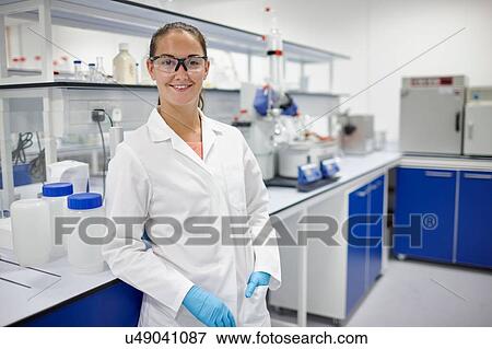 Scientist smiling in laboratory View Large Photo Image Stock Photo - Scientist smiling in laboratory. Fotosearch