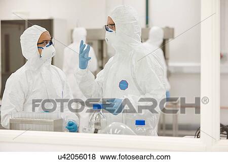 Scientists working in laboratory View Large Photo Image Stock Photo - Scientists working in laboratory. Fotosearch