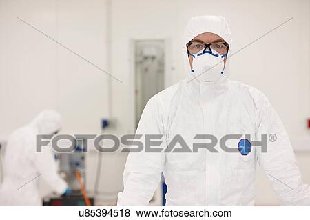 Scientists working in laboratory View Large Photo Image Stock Photo - Scientists working in laboratory. Fotosearch