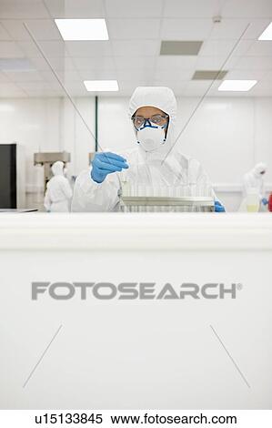 Stock Photography - Scientists working in laboratory. Fotosearch