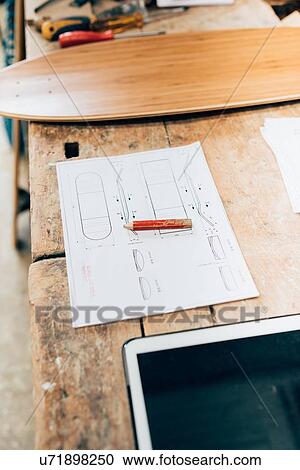 Skateboard, design and tablet in workshop View Large Photo Image Stock Image - Skateboard, design and tablet in workshop. Fotosearch