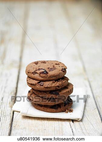 Stack of black forest cookies on tea towel View Large Photo Image Stock Photograph - Stack of black forest cookies on tea towel. Fotosearch