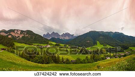 Stock Image - Storms clouds over Dolomite landscape, Italy. Fotosearch