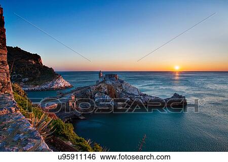 Stock Photograph - Sunset over sea at Porto Venere, Italy. Fotosearch