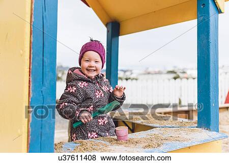 Toddler playing with sand, Reykjavik, Iceland View Large Photo Image Stock Photo - Toddler playing with sand, Reykjavik, Iceland. Fotosearch