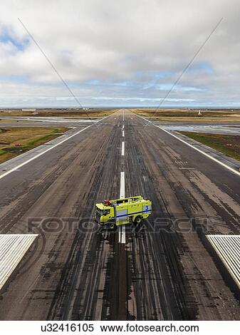 Truck in centre of airport runway, Keflavik, Iceland View Large Photo Image Stock Photography - Truck in centre of airport runway, Keflavik, Iceland. Fotosearch