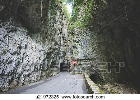 Stock Photography - Tunnels in rock hill, Garda, Italy. Fotosearch