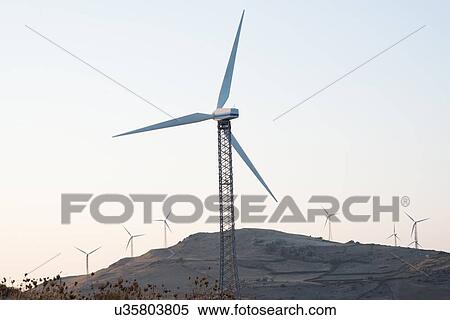 Wind turbines on mountain, Castelsardo, Sardinia, Italy View Large Photo Image Stock Photography - Wind turbines on mountain, Castelsardo, Sardinia, Italy. Fotosearch