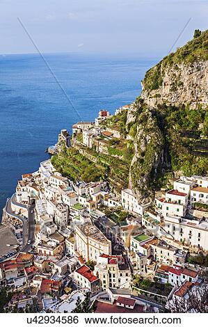 Aerial view of coastal town View Large Photo Image Stock Photograph - Aerial view of coastal town. Fotosearch