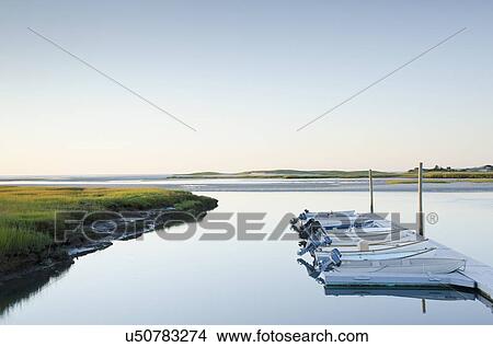 Picture - Boats moored in dock. Fotosearch