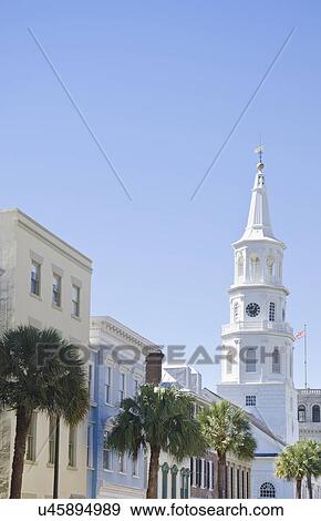 Buildings and palm trees in city View Large Photo Image Stock Photo - Buildings and palm trees in city. Fotosearch