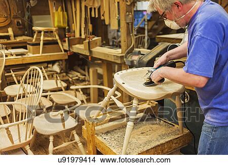 Carpenter polishing chair with sander View Large Photo Image Picture - Carpenter polishing chair with sander. Fotosearch