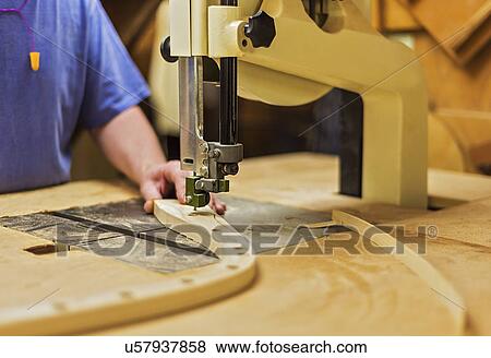Carpenter working in workshop View Large Photo Image Stock Photo - Carpenter working in workshop. Fotosearch