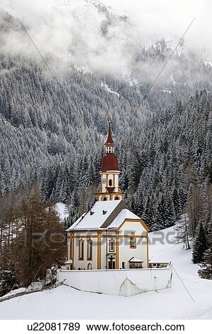 Stock Photo - Church with forest in background. Fotosearch