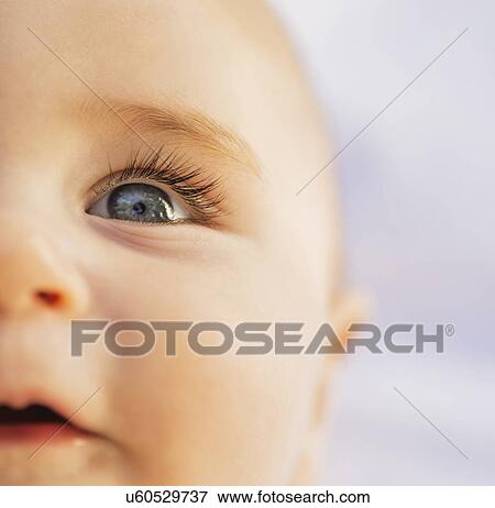 Close-of baby boy's (6-11 months) blue eye View Large Photo Image Stock Photo - Close-of baby boy's (6-11 months) blue eye. Fotosearch