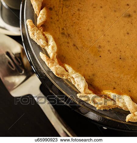 Close-up of pumpkin pie for Thanksgiving View Large Photo Image Stock Image - Close-up of pumpkin pie for Thanksgiving. Fotosearch